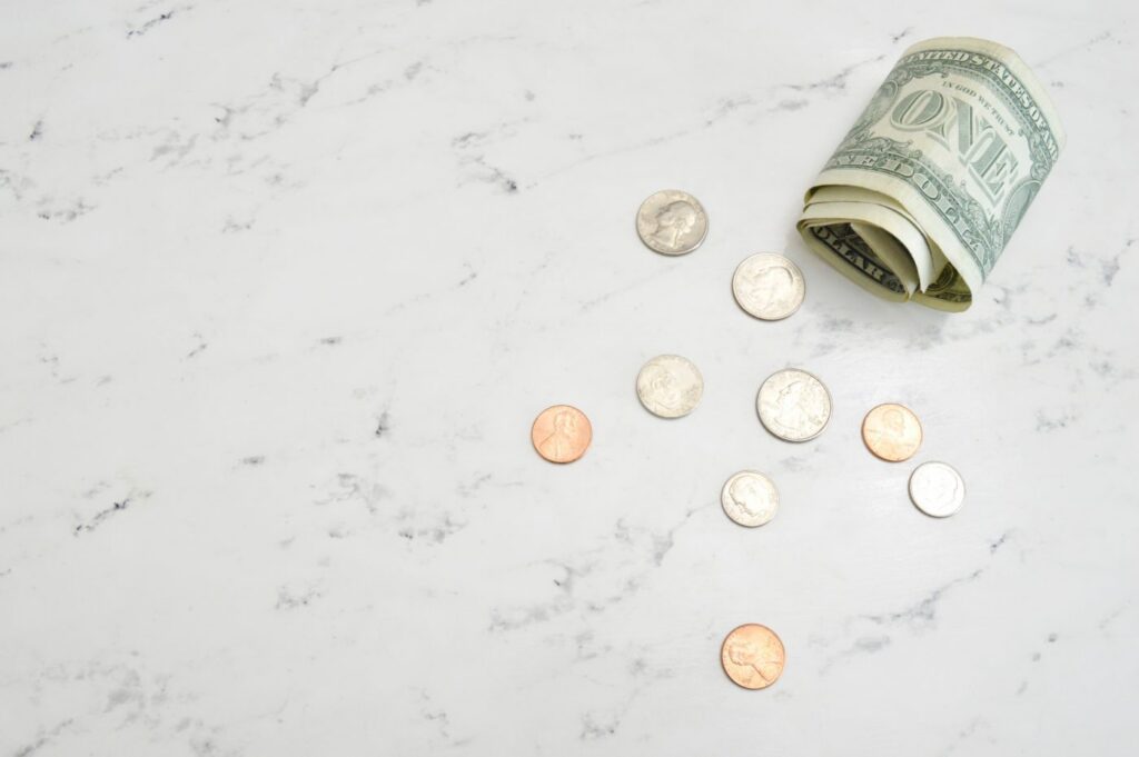 dollar bill and coins