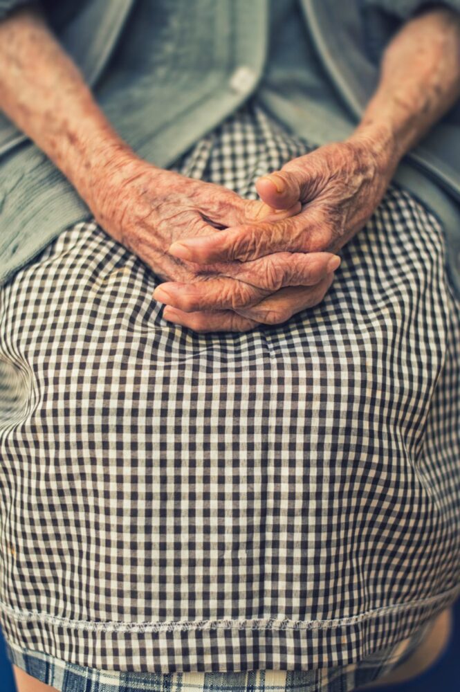 woman with hands folded