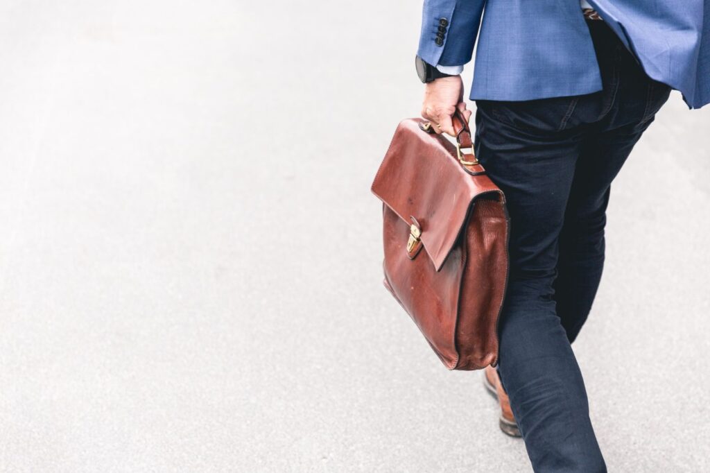 person with satchel